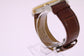 Optima Herren-Armbanduhr mit römischen Ziffern und Strassbesatz